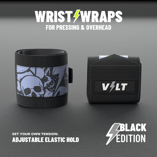 VOLT elastic wrist wraps for pressing and overhead, BlackEdition (grey print), on a grey rubber gym floor, adjustable elastic hold #BlackEdition