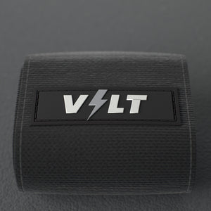 VOLT elastic wrist wraps, BlackEdition (grey print), close-up of the VOLT logo patch #BlackEdition