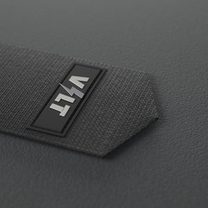 VOLT elastic wrist wraps, BlackEdition (grey print), close-up of the VOLT tab #BlackEdition