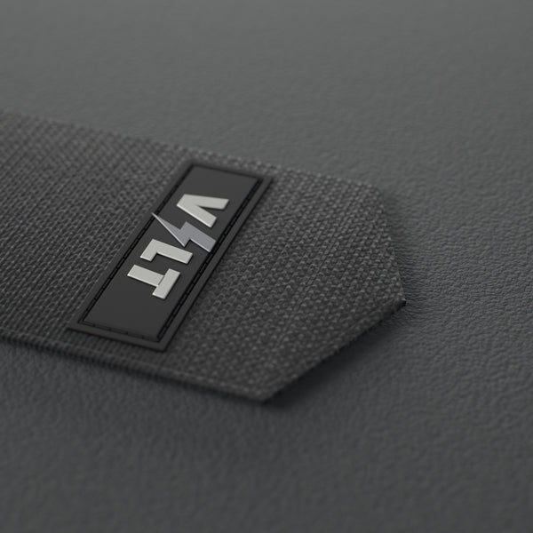 VOLT elastic wrist wraps, BlackEdition (grey print), close-up of the VOLT tab #BlackEdition