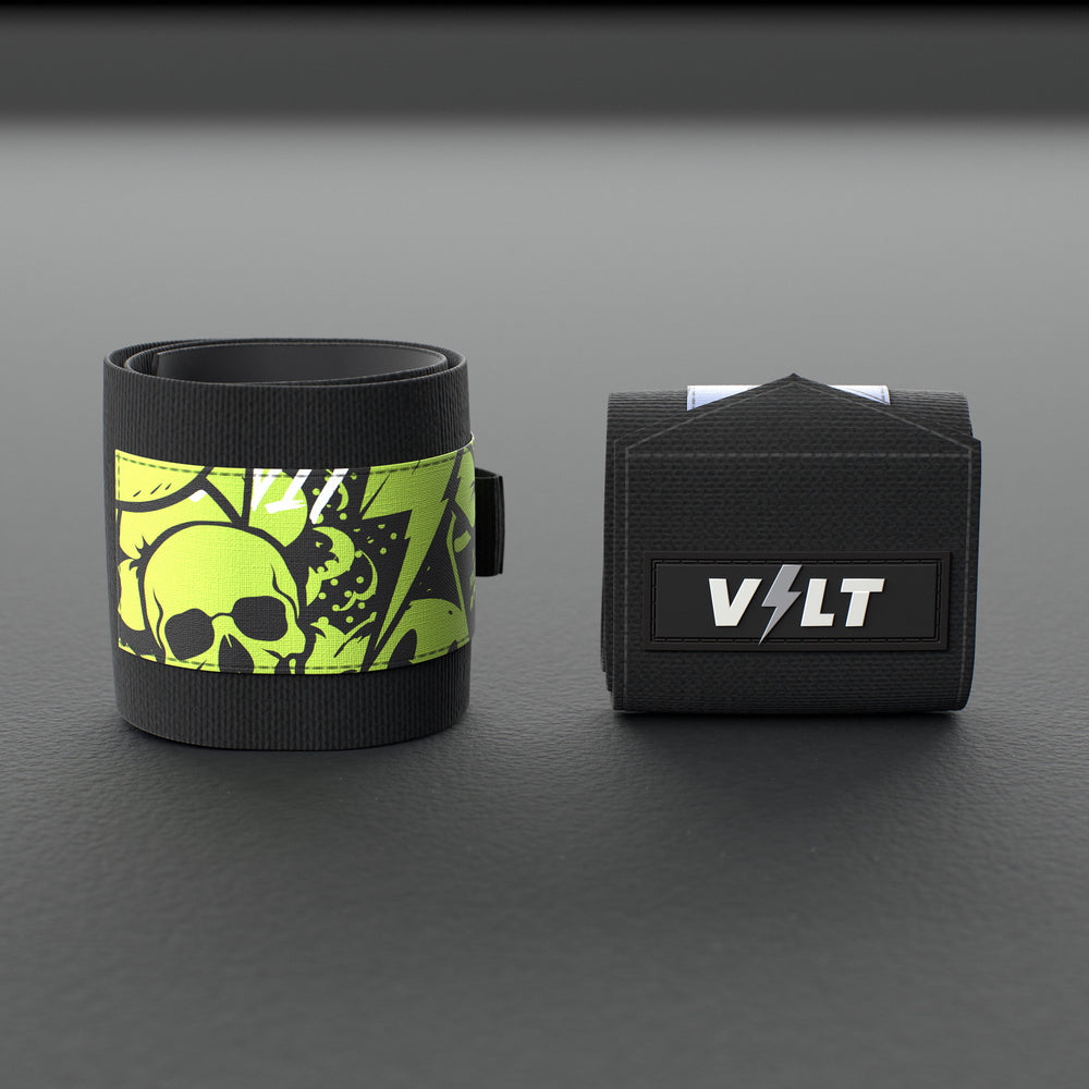VOLT elastic wrist wraps, one Original (lime print) and one BlackEdition (grey print), on a grey rubber gym floor