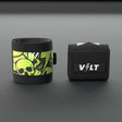 VOLT elastic wrist wraps, one Original (lime print) and one BlackEdition (grey print), on a grey rubber gym floor