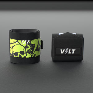 VOLT elastic wrist wraps, one Original (lime print) and one BlackEdition (grey print), on a grey rubber gym floor
