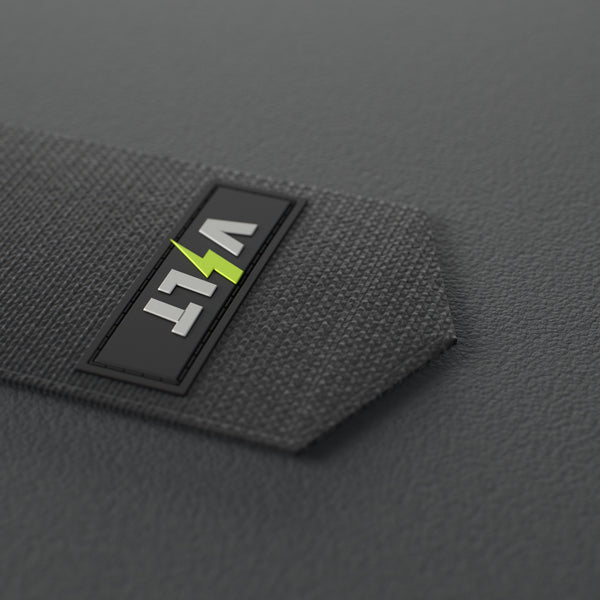 VOLT elastic wrist wraps, Original (lime print), close-up of the VOLT tab #Original