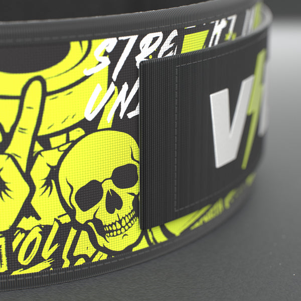 VOLT IronBelt 4" weightlifting belt, Original (lime print), close-up of the strap end and VOLT tab #IronBeltOriginal