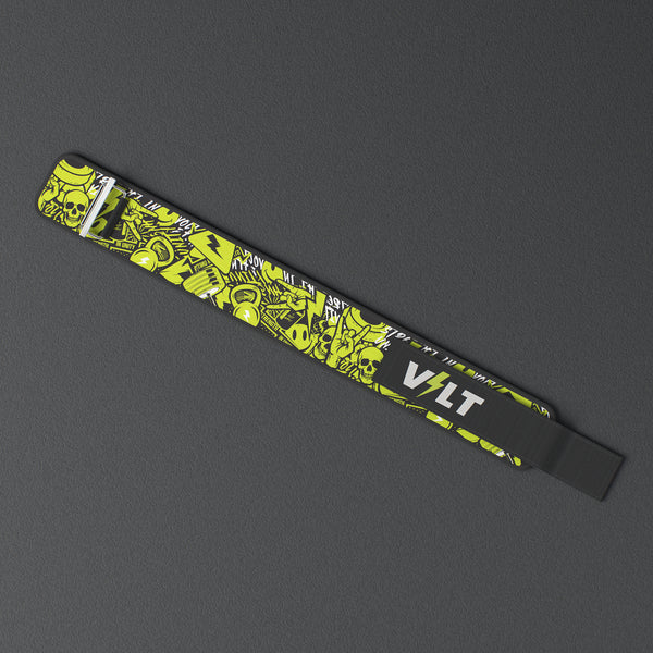VOLT IronBelt 4" weightlifting belt, Original (lime print), laid flat, from above, on a rubber floor #IronBeltOriginal