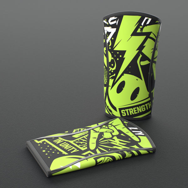 VOLT knee sleeves, Original (lime print), one standing and one laid flat on a grey rubber gym floor #Original