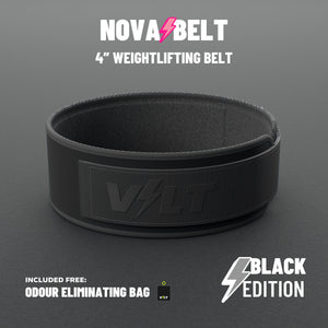 VOLT NovaBelt 4" weightlifting belt, BlackEdition (black VOLT logo on black), standing on a grey rubber gym floor #NovaBeltBlackEdition