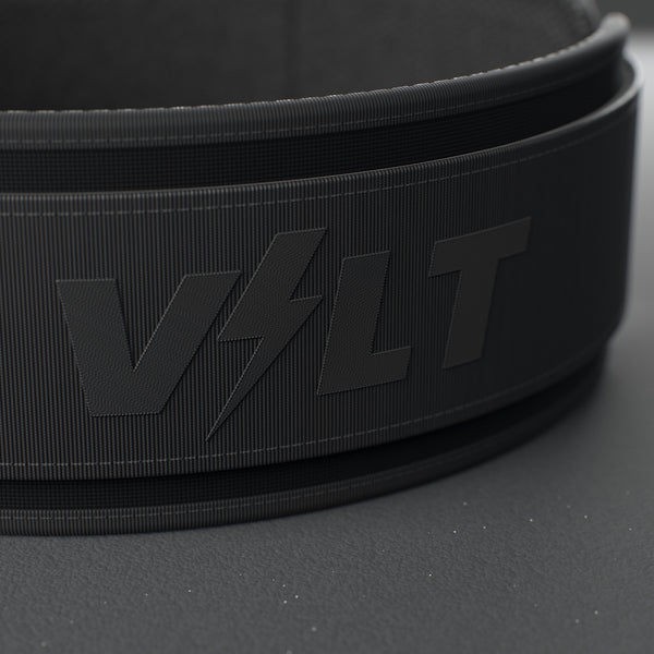 VOLT NovaBelt 4" weightlifting belt, BlackEdition (black VOLT logo on black), close-up of the VOLT logo #NovaBeltBlackEdition