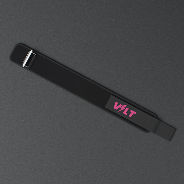 VOLT NovaBelt 4" weightlifting belt, Pink (pink VOLT logo on black), laid flat, from above, on a rubber floor #NovaBeltPink