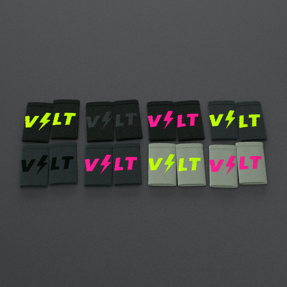VOLT sweatbands, all eight colourways on a grey rubber gym floor
