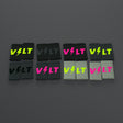 VOLT sweatbands, all eight colourways on a grey rubber gym floor